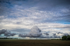 Storm clouds floating over Indiana farmland | Image By Indiana Architectural Photographer Jason Humbracht